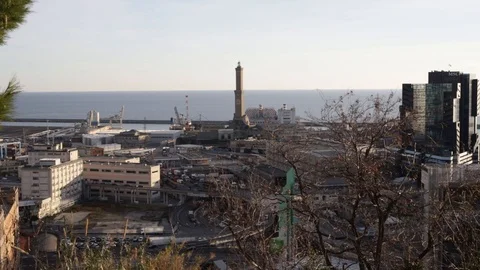 The lighthouse of Genoa called Lanterna and buildings of the Port Stock-Footage 101395699