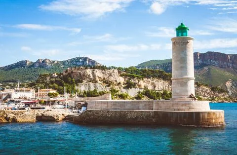 Lighthouse in harbour of Cassis Stock Photos