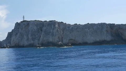 Lighthouse on High Cliff Stock Footage 77355866