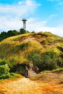 Lighthouse on a hill Stock Photos