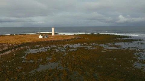 Lighthouse in Iceland. Drone video. Stock Footage 119996490