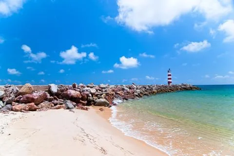 Lighthouse on the island. Stock Photos