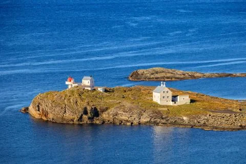 Lighthouse on island Stock Photos