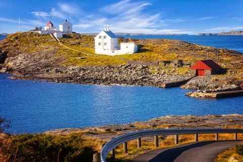 Lighthouse on island Stock Photos