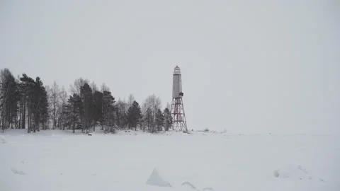 Lighthouse on the island in winter Video stock 149512664