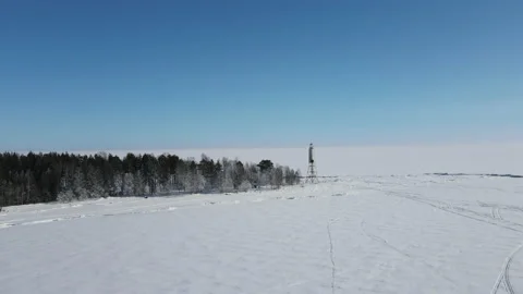 Lighthouse on the island in winter Stockbeeldmateriaal 150052920