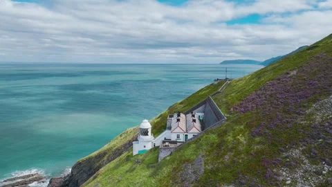 The Lighthouse Keepers Cottage from a drone, Foreland Point, Lynton, Devon, UK Stock Footage 248525114