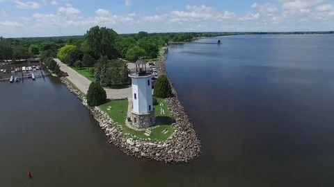 Lighthouse lake drone rise Stock Footage 73097060