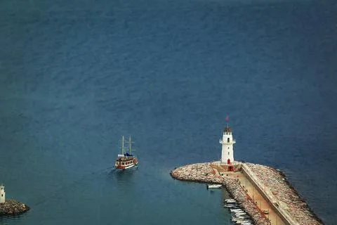 Lighthouse on a large pier from the top view Stock Photos