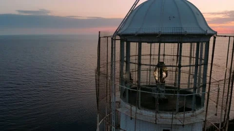 Lighthouse light spining around. The light comes from Fresnel lens. Stock Footage 163047978