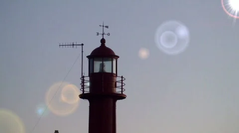 Lighthouse lighted at beautiful sunset Video stock 280197