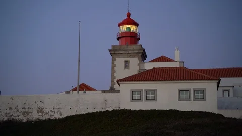Lighthouse lights turned on shining at Cape Roca Stock Footage 110760799