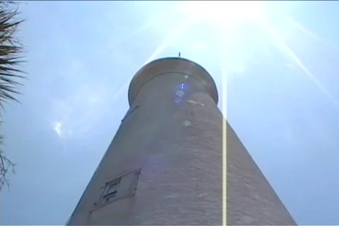 Lighthouse Lit Up By Sun Stock Footage 486875