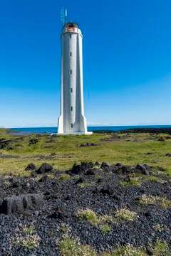 Lighthouse Londrangar with Flowers Stock Photos