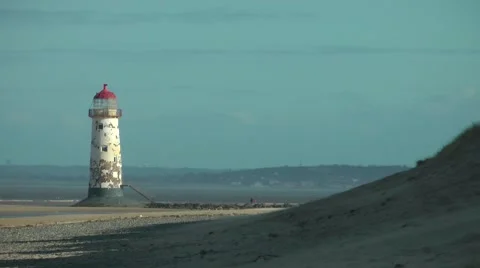 Lighthouse low tide on coast Stock Footage 47072499