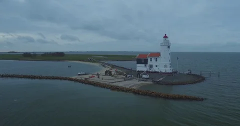Lighthouse of marken going around with drone shot Stock Footage 70895146