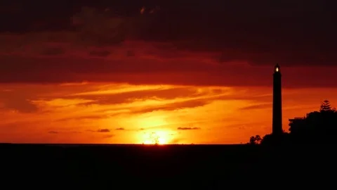 LIGHTHOUSE MASPALOMAS DUNE DRAMATIC SUNSET WITH 4K GRAN CANARIA 스톡 동영상 84513950