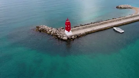 Lighthouse in middle of sea Stock Footage 284917228
