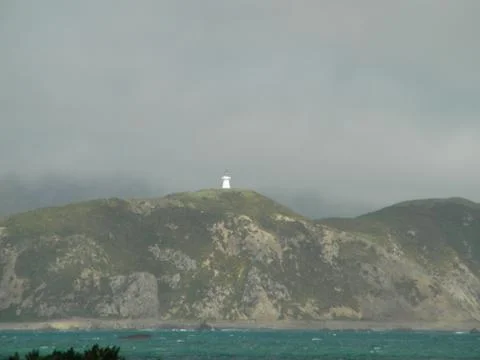 Lighthouse mist Stock Photos