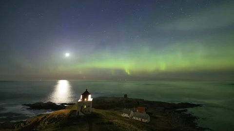 Lighthouse, moon and notrhern lights Stock Footage 250428220