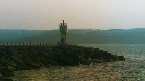 Lighthouse near harbor. Stock Footage 3149895