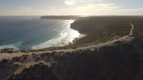 Lighthouse near rugged ocean Stock Footage 279295979