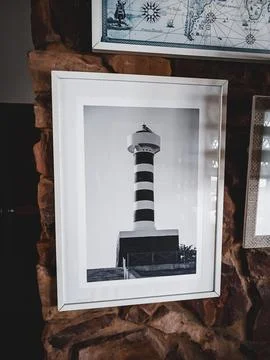 Lighthouse at night on the beach Stock Photos
