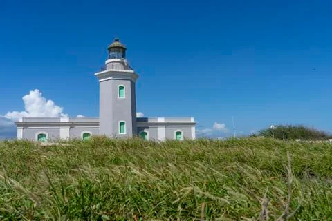 Lighthouse on an ocean cliffside Stock Photos