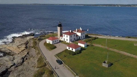 Lighthouse Ocean Coast Beach in Rhode Island - Aerial 4K 스톡 동영상 116195469