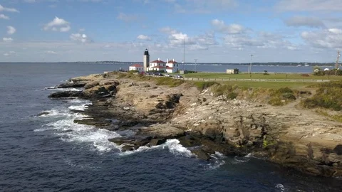Lighthouse Ocean Coast Beach in Rhode Island - Aerial 4K Stock Footage 116195759