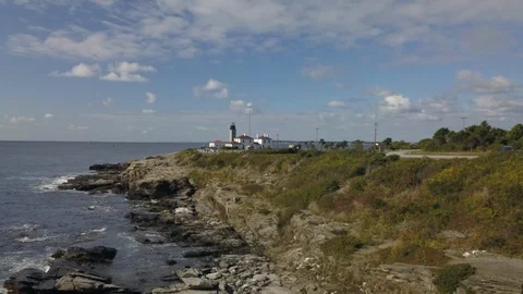 Lighthouse Ocean Coast Beach in Rhode Island - Aerial 4K Stock Footage 116195963