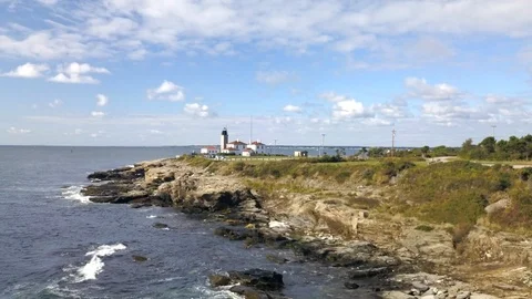 Lighthouse Ocean Coast Beach in Rhode Island - Aerial 4K Stock Footage 116196124