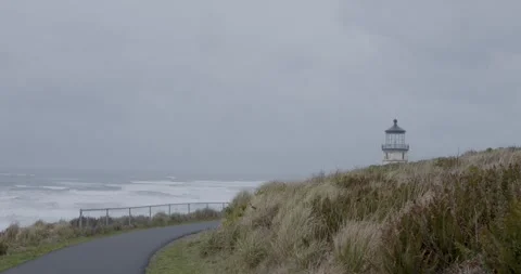 Lighthouse with Ocean Fog Stock Footage 260678808