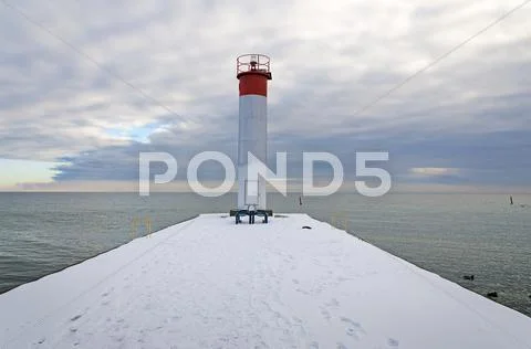 Lighthouse on ontario lake, whitby, ontario, canada. winter time Stock Photos