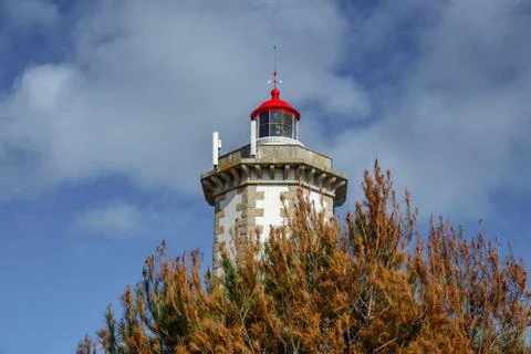 Lighthouse over the cloudy sky Foto stock