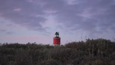 Lighthouse over dunes on Opal Coast in France Video stock 332109276
