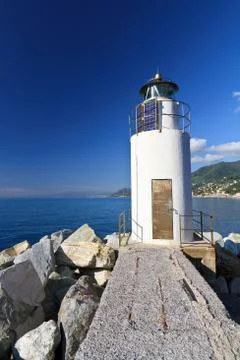 Lighthouse over the sea Stock Photos