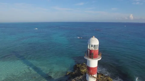 Lighthouse Overhead Aerial View Waves Crashing on Rocky Cliffs Cancun Mexico Video stock 63148286