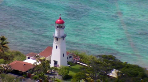 A Lighthouse Overlooks the Shallow Waters Stock Footage 5296803