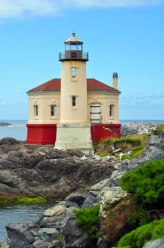 Lighthouse on the pacific coast Stock Photos