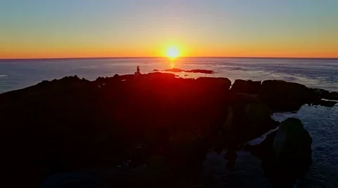 A lighthouse on Pacific ocean at sunset Stock Footage 55662090