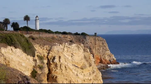 Lighthouse, Palms LS on Cliffs Above Pacific Ocean 스톡 동영상 45146585