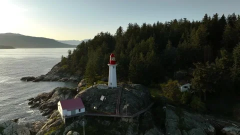 Lighthouse park backlight north vancouver pacific coast lighthouse Stock Footage 241369964
