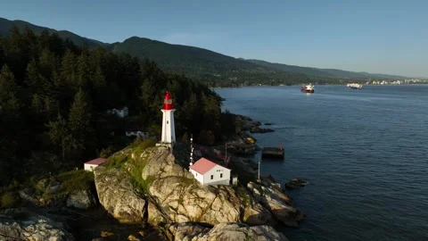 Lighthouse Park at sunset dronie shot aerial Stock Footage 241369982