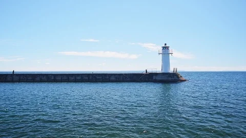 Lighthouse on pier Stock Footage 95774219