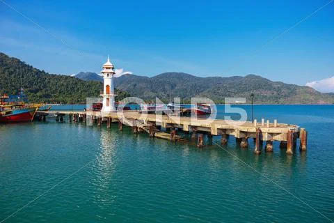 Lighthouse on a pier on Koh Chang Island in Thailand Stock Photos