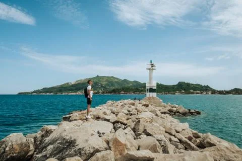 Lighthouse on the pier Stock Photos