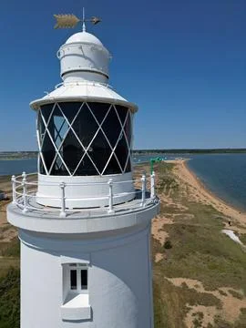 Lighthouse pointing wind direction  vertical shot Stock Photos