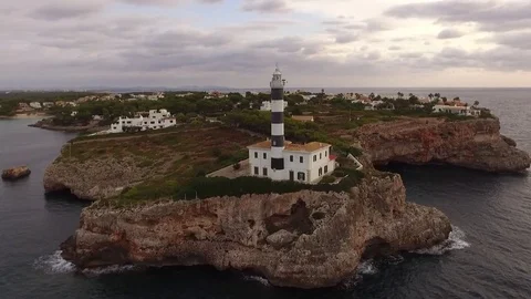  Lighthouse at Ponta de Ses Crest in Mallorca Stock Footage 71279972