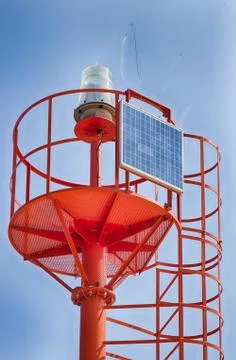 Lighthouse powered by solar panel Stock Photos